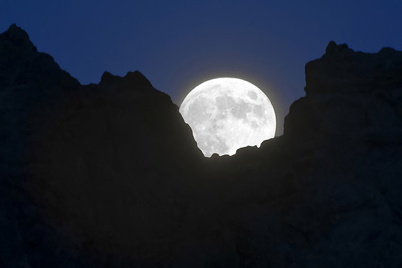 Moon Behind Sea Stack