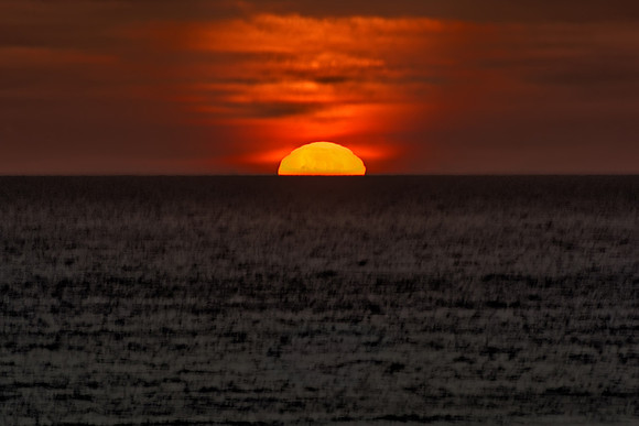 Sun Setting into Ocean